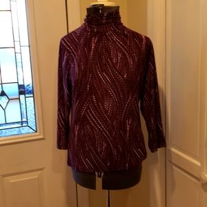 Susan Graver liquid knit turtleneck tunic top. Size medium. Color reads mauve.